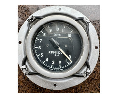 Original SMITHS rev counter complete with holder.