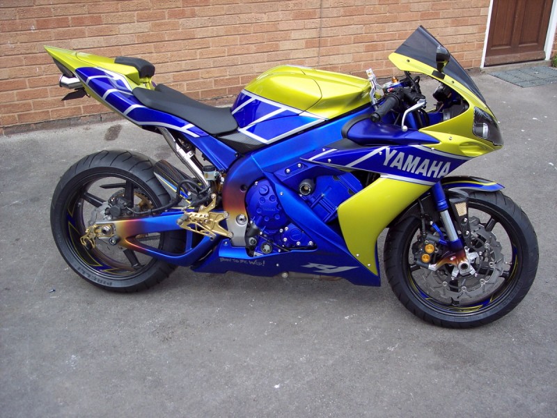 Yamaha YZFR 1
Carbon Wheels , Ohlins suspension front and rear , modified exhaust and slipper clutch along with a bit of paint . 
